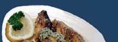 Jawaneh: Chicken wings marinated in garlic.