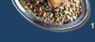Farrouj Mehshi: Stuffed chicken with pine nuts, blanched almonds and pistachio nuts.